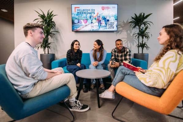 student sitting together chatting